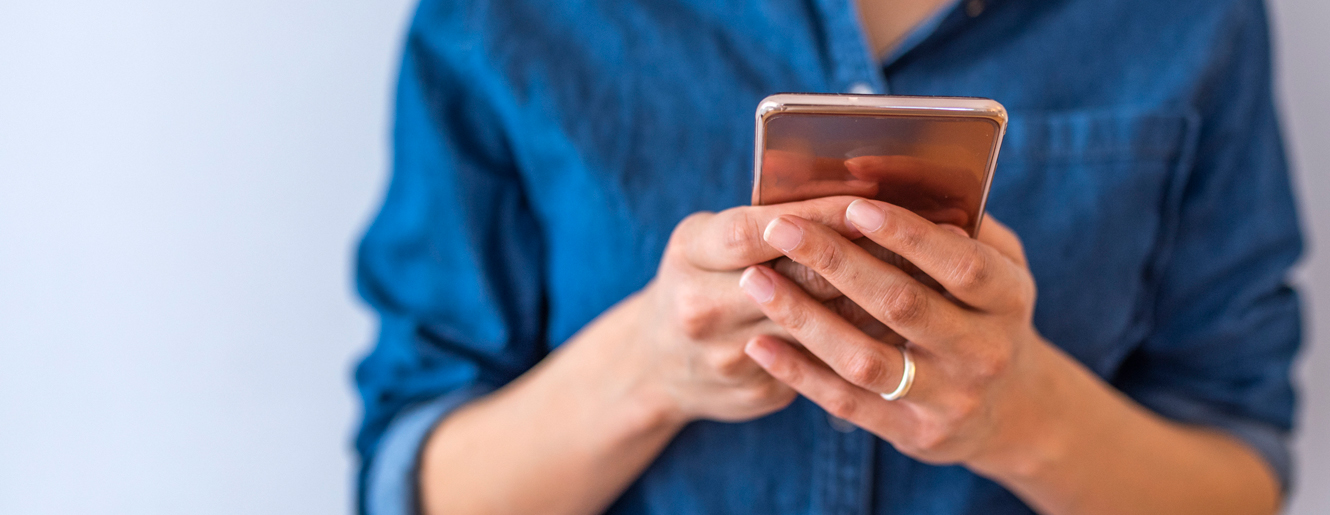 Person holding a cell phone